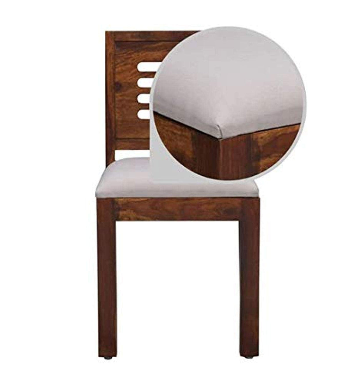 Capsule Hollow Cushion Solid Sheesham Wood 2 Seater Dining Table Set in natural finish - styled in a dining room