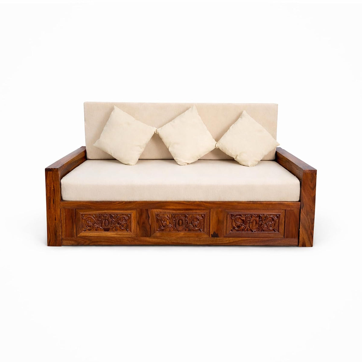 A sheesham wooden daybed or sofa with a carved reddish-brown frame, cream-colored seat cushion, and three matching square back pillows, shown against a plain white background.